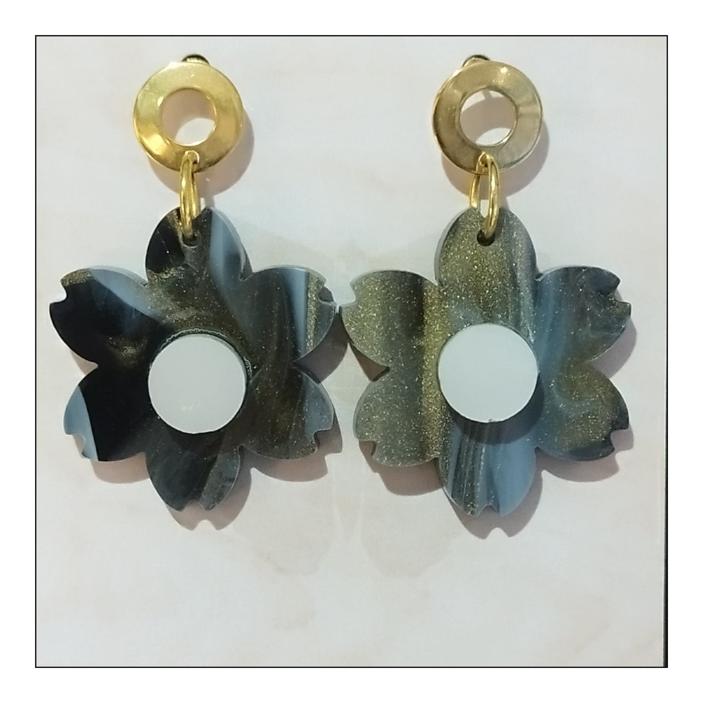 BO grande fleur noir coulé monture dorée